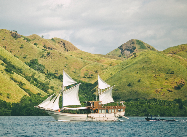 Sailboat sailing through the Flores Sea near Alor, Indonesia